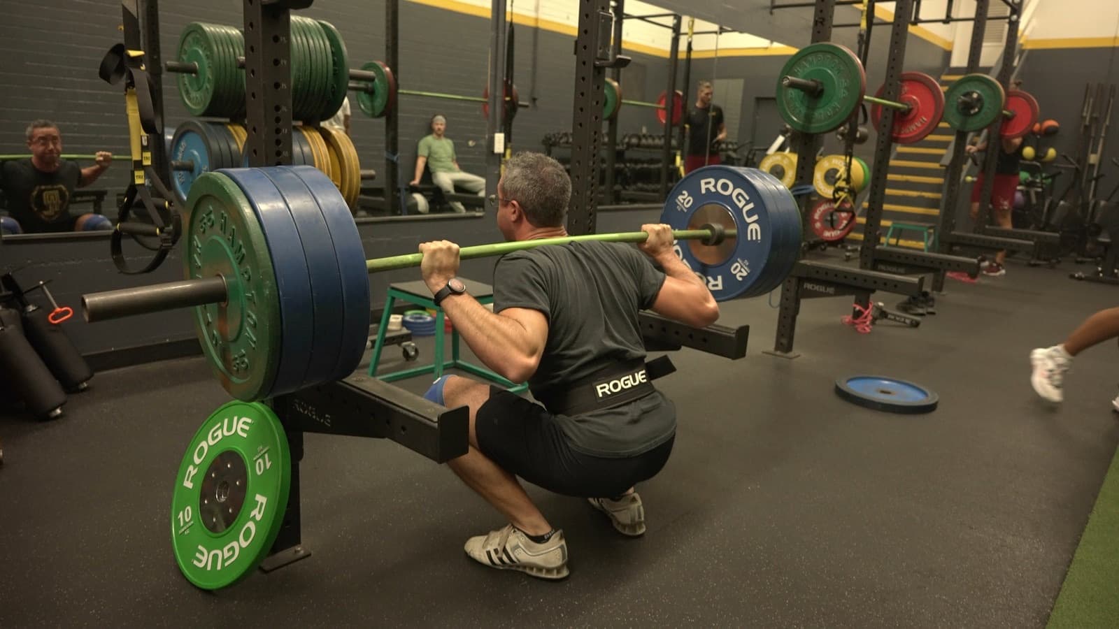 Dr. Jacob Goodin training on the weight-room floor